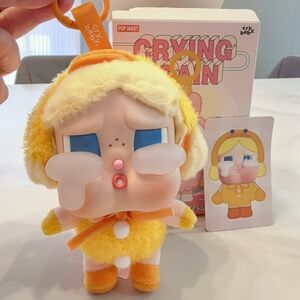 Crying Baby Plush Toy in Yellow and Orange